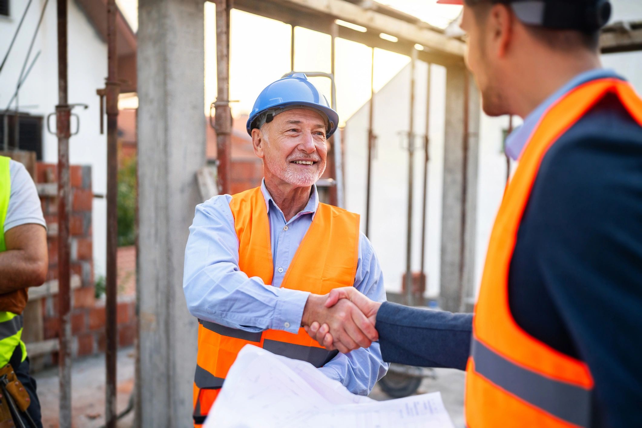 Construction professionals meeting on site