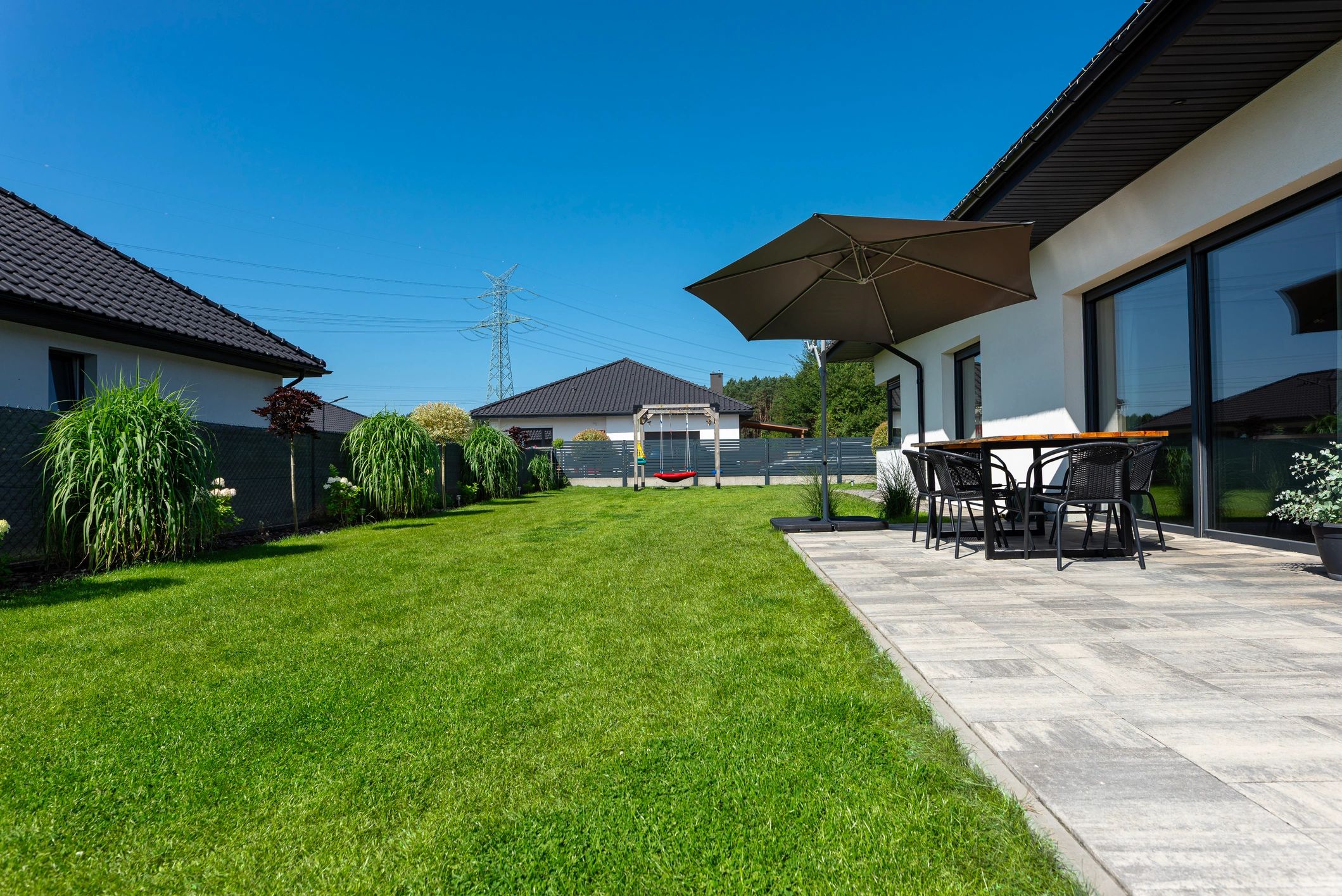Luxury home exterior with landscaped grounds