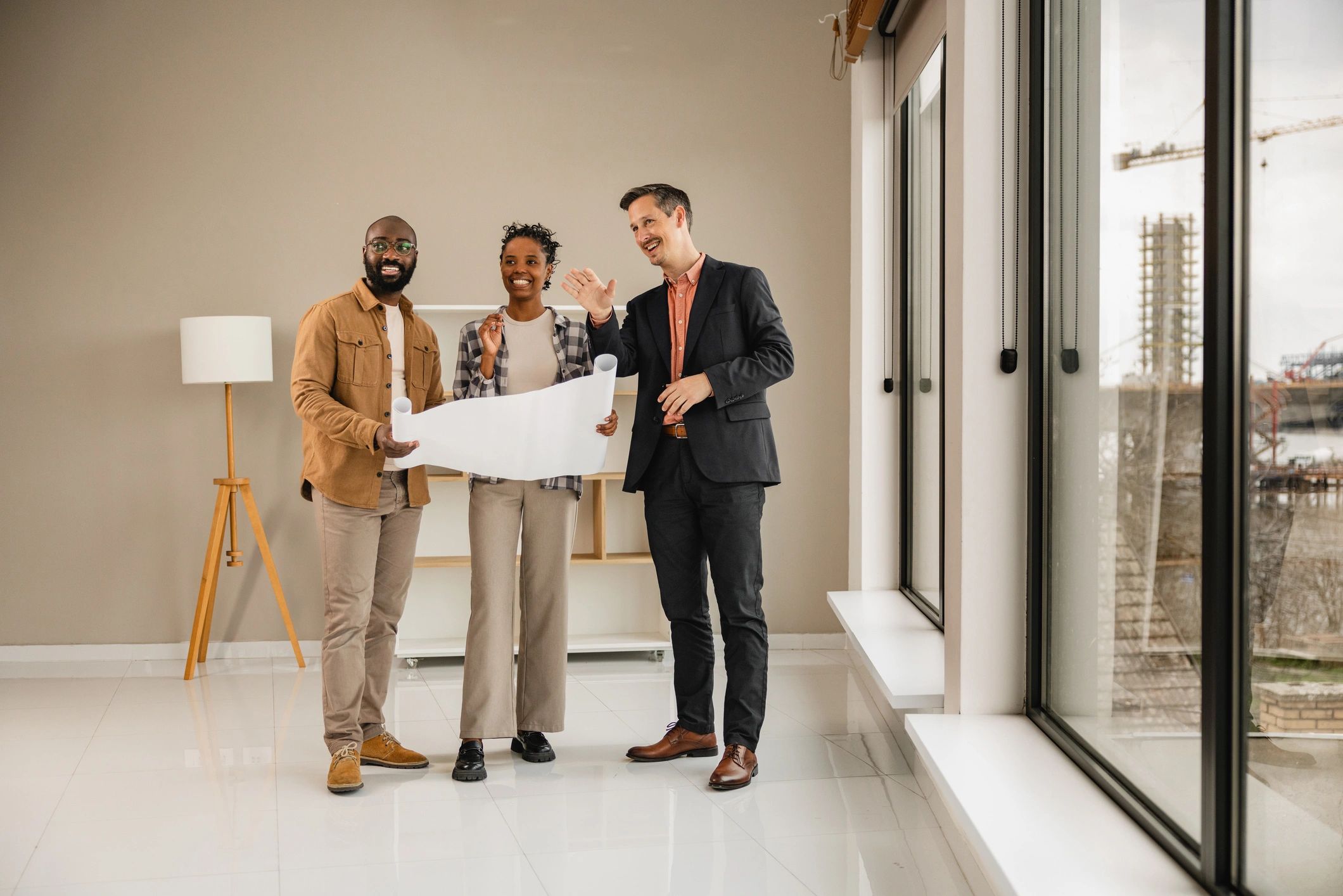 Clients reviewing plans and strategy with consultant